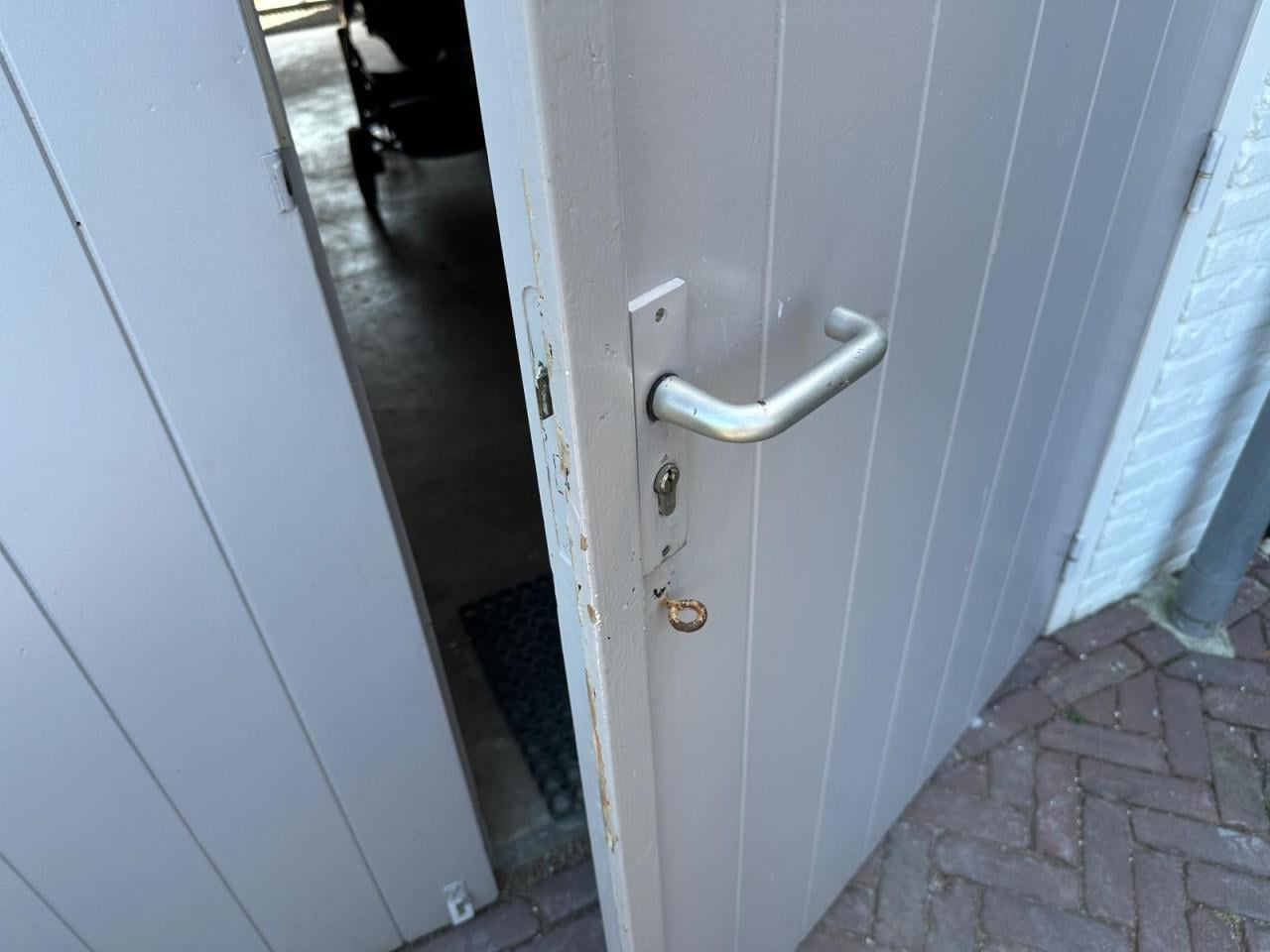 Dubbele garagedeur massief hout