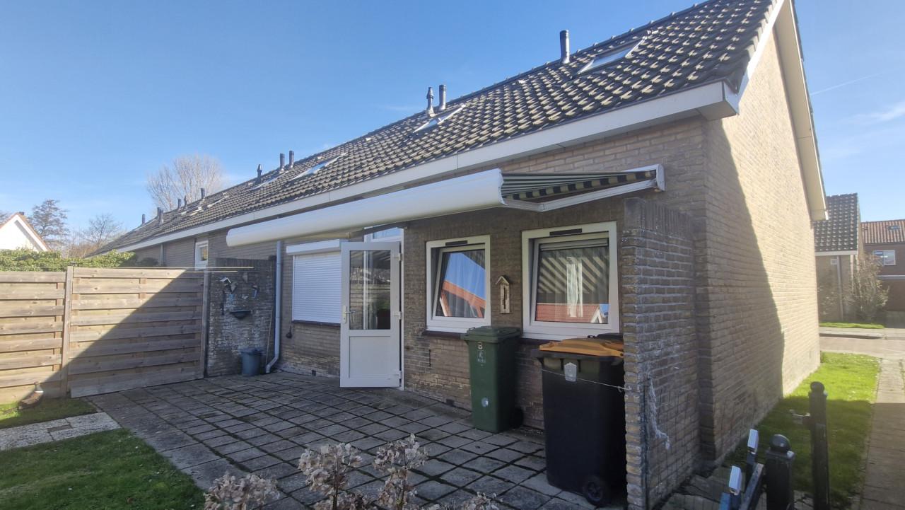 Knikarm zonnescherm electrisch