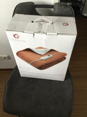 Elektrische warmtedeken en een nek en schouder massage apparaat