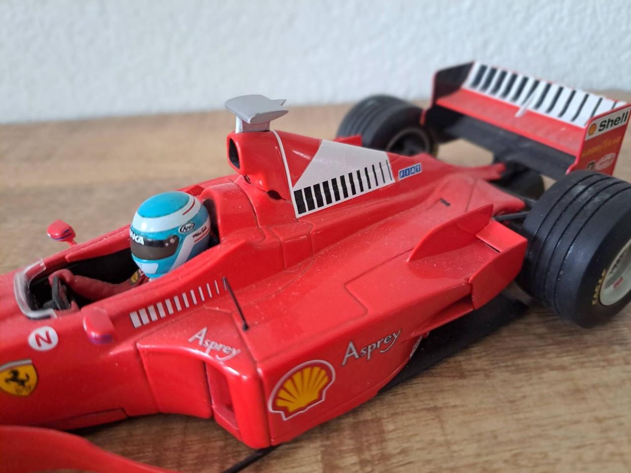 Ferrari F300 Formule 1-raceauto uit het seizoen 1998 van coureur Michael Sc