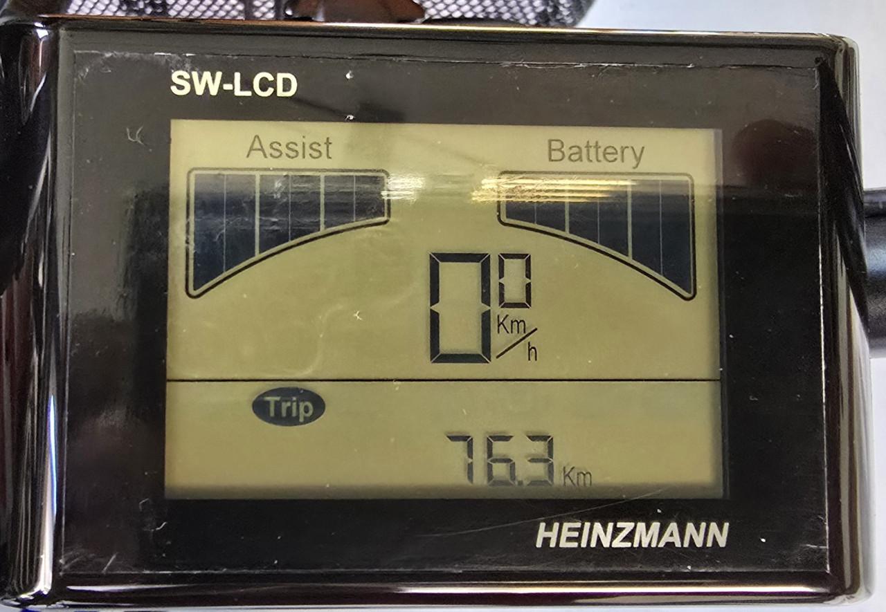 Elektrisch ondersteunde driewiel fiets.