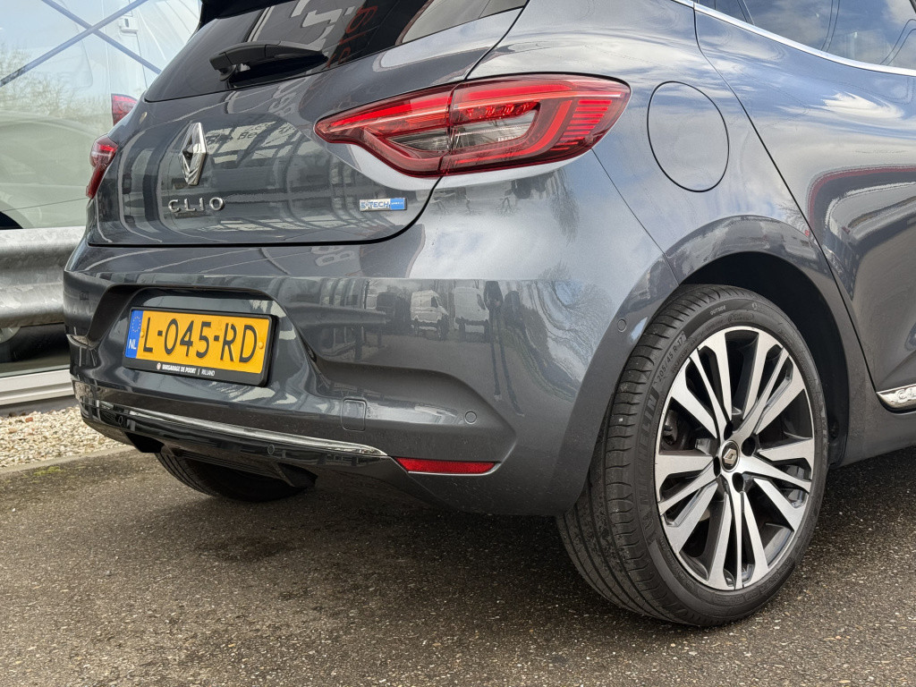 Renault Clio 1.6 e-tech hybrid 140 initiale paris | nl-auto | dealer ond. |
