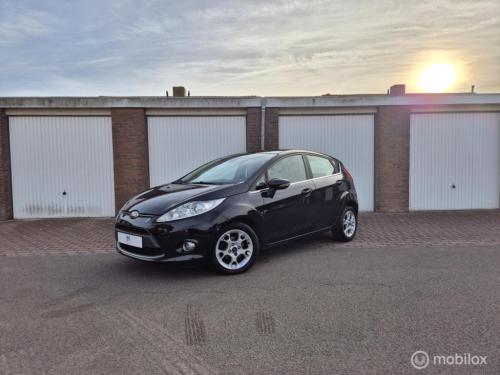 Ford Fiesta 1.25 titanium / dealeronderhouden / voorruitverwarming / stoelv