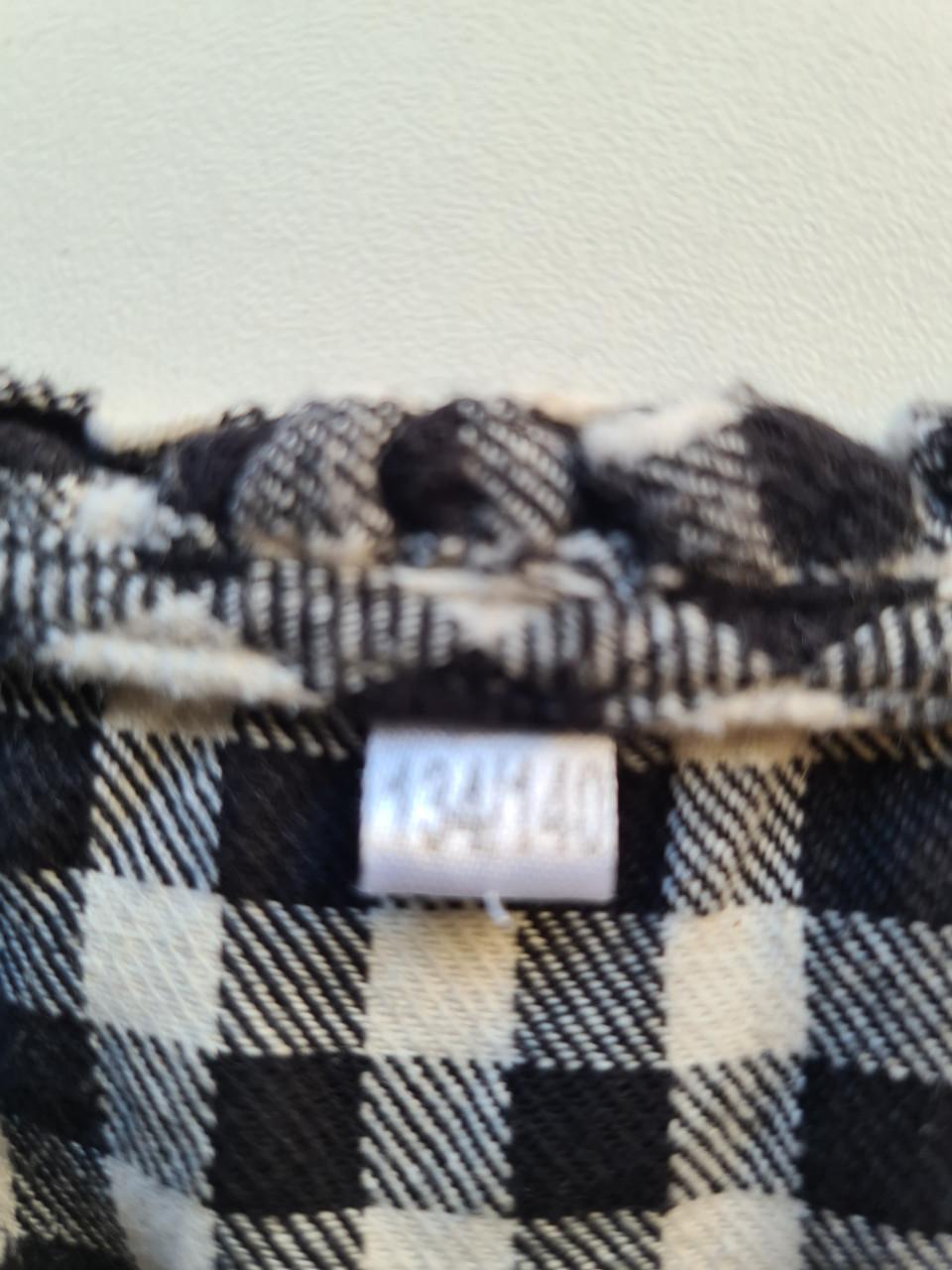 Zwart-wit geblokt jurkje met roezel van Zeeman  Maat 134-140