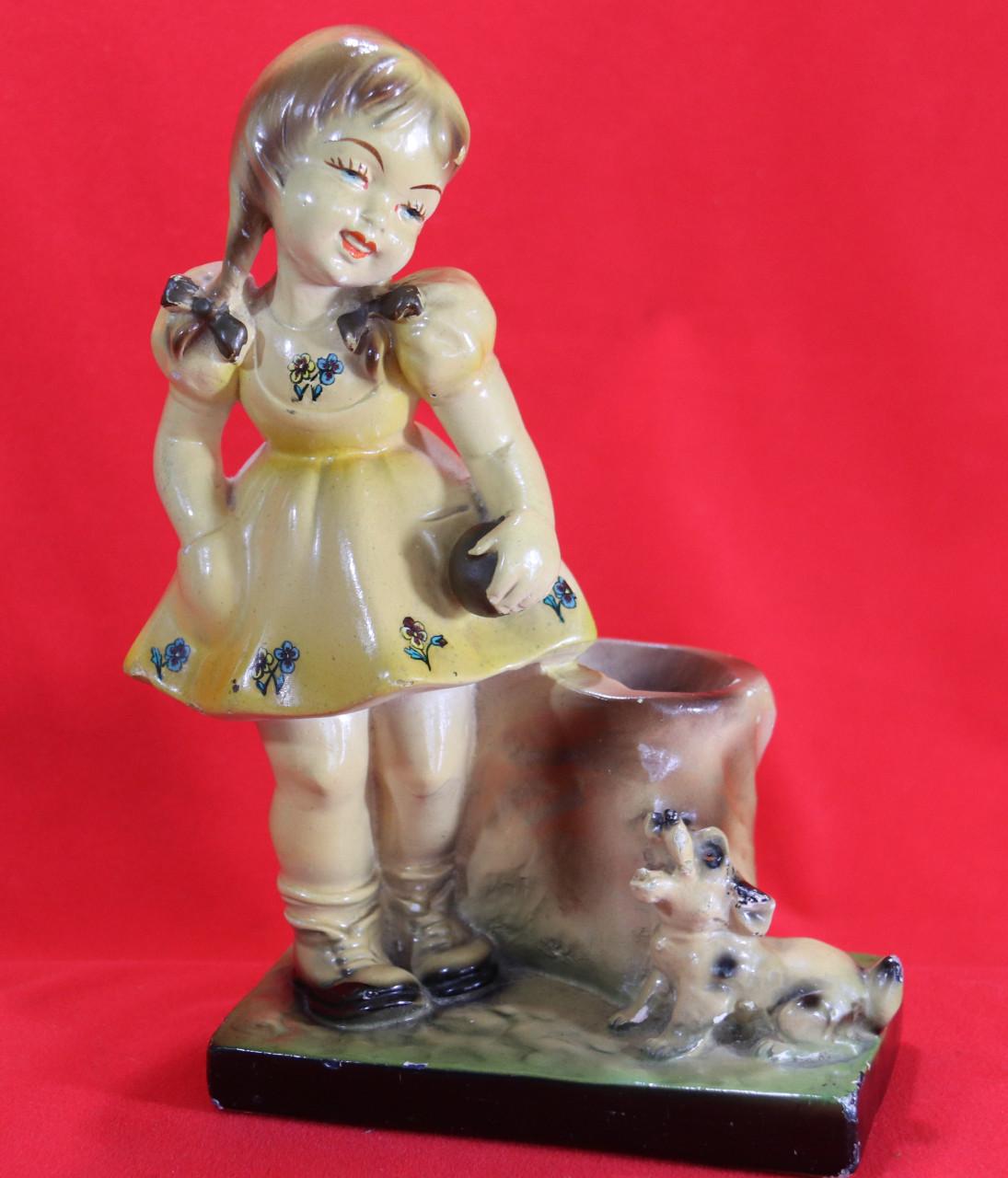 Antiek beeldje van kindje met hondje