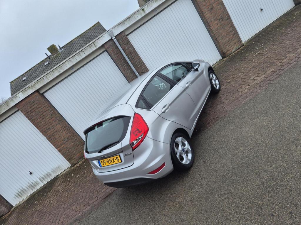 Ford Fiesta 1.25 titanium / origineel nl / airco / verwarmde voorruit