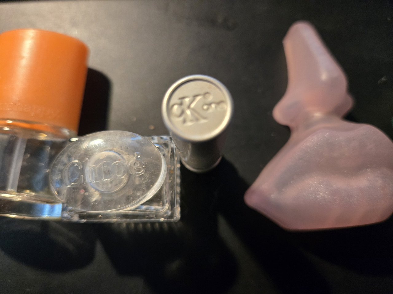 Miniflesjes eau de toilette 6x  Leeg of deels gebruikt.