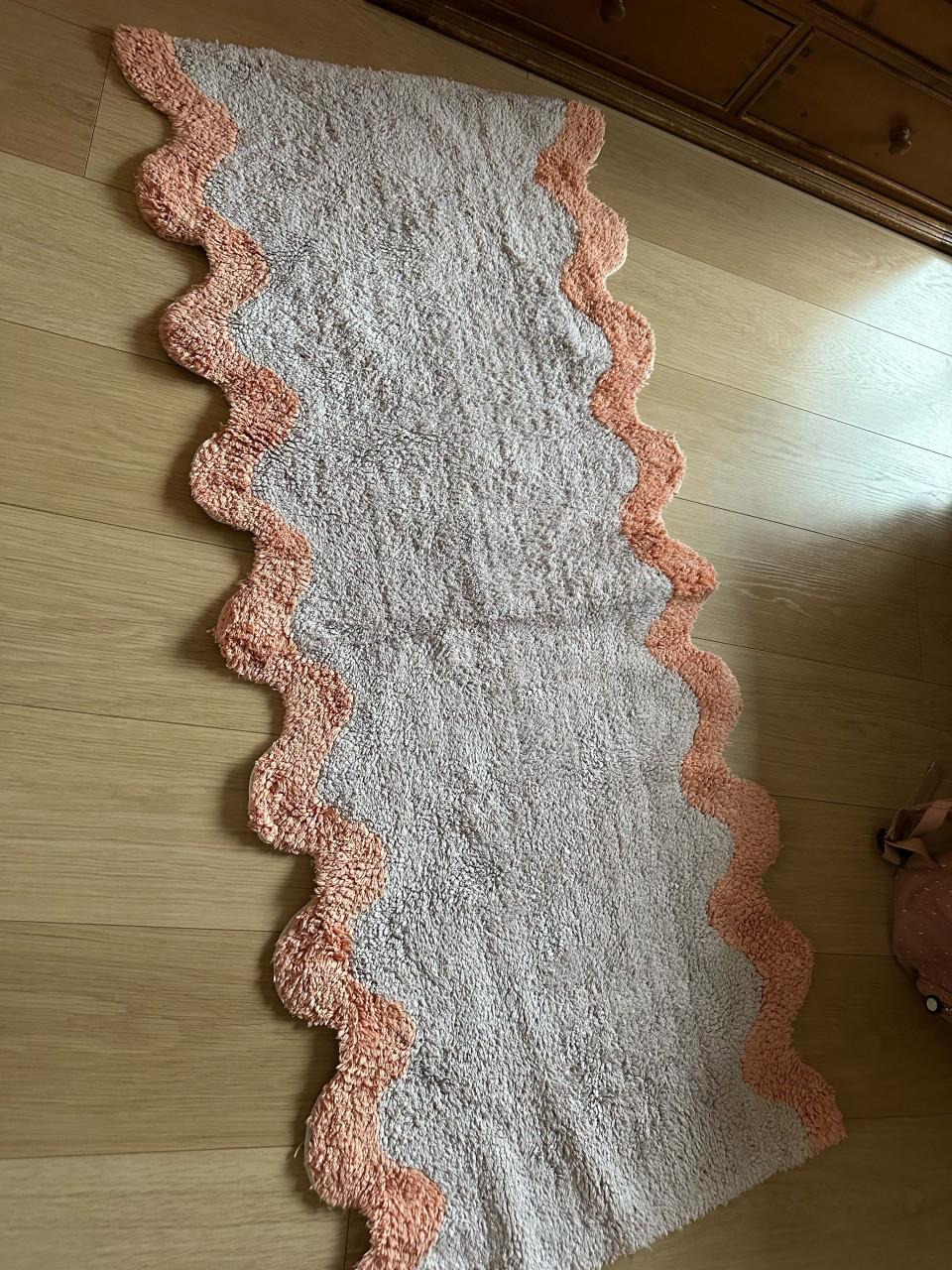 Vloerkleedje met speelse rand