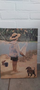 Canvasafbeeling kind met tekkel aan water