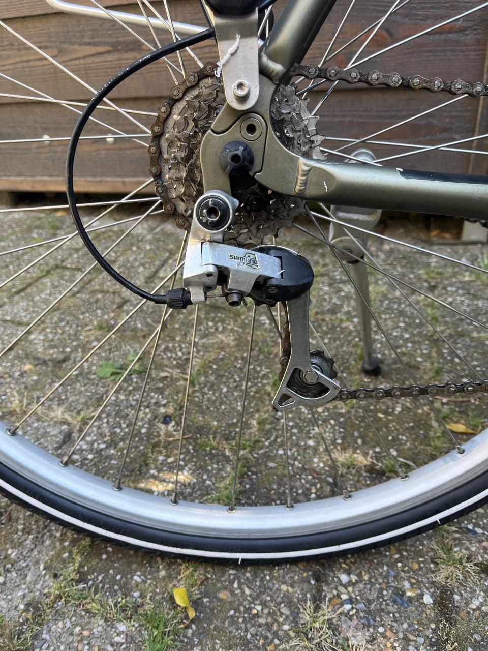 Herenfiets Sportfiets Sparta Marathon 21 versn. Velgrem, verlichting.