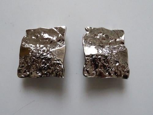 Vintage clip-on Oorbellen gehamerd metaal Brutalisme
