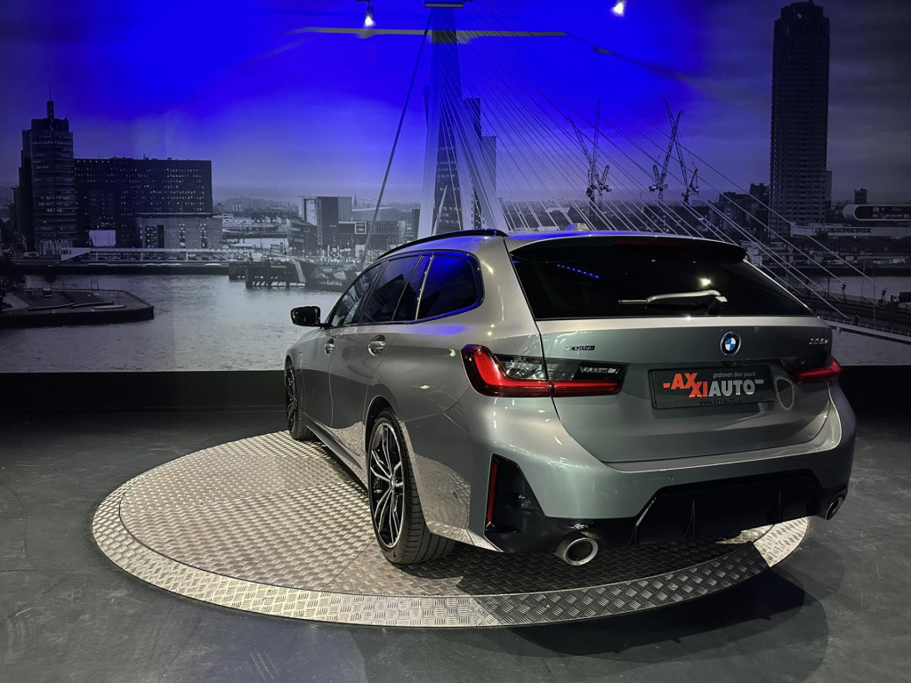 BMW 3-serie touring 330e xdrive *pano*360camera*sportstoelen*laser*