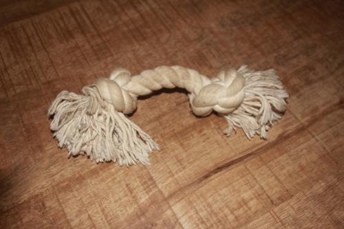 Wit speeltje van touw,,vorm bot