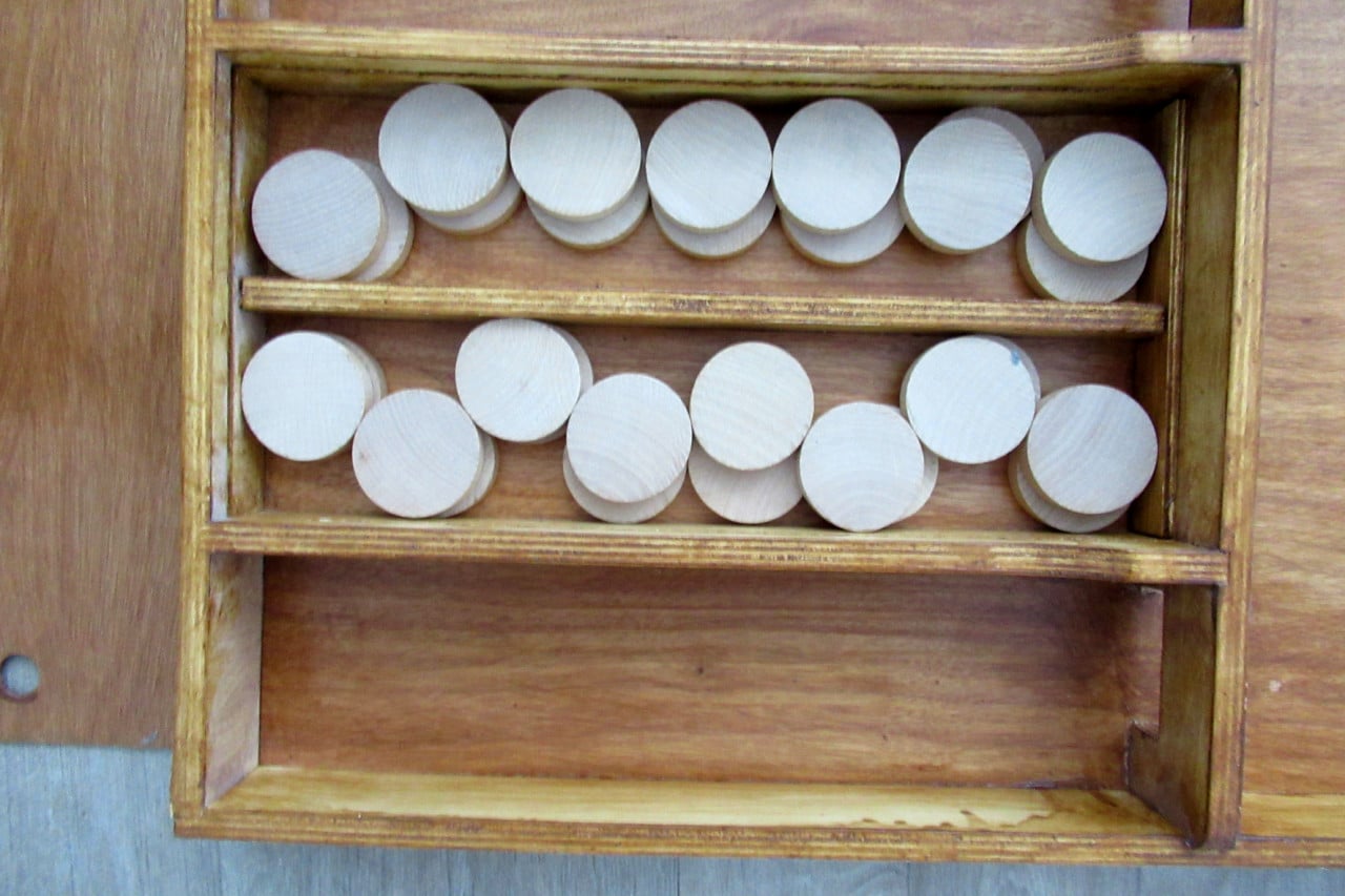 Longfield Sjoelbak te koop met 30 houten schijven