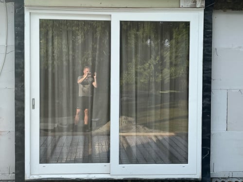 Hardhouten schuifpui met dubbel glas