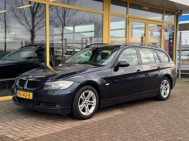 BMW 3-serie touring 318i | pano | trekhaak | xenon | garantie