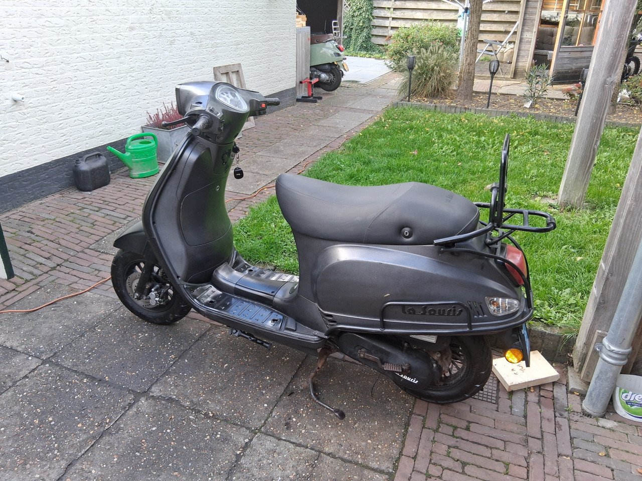 La souris blauw kenteken met werk