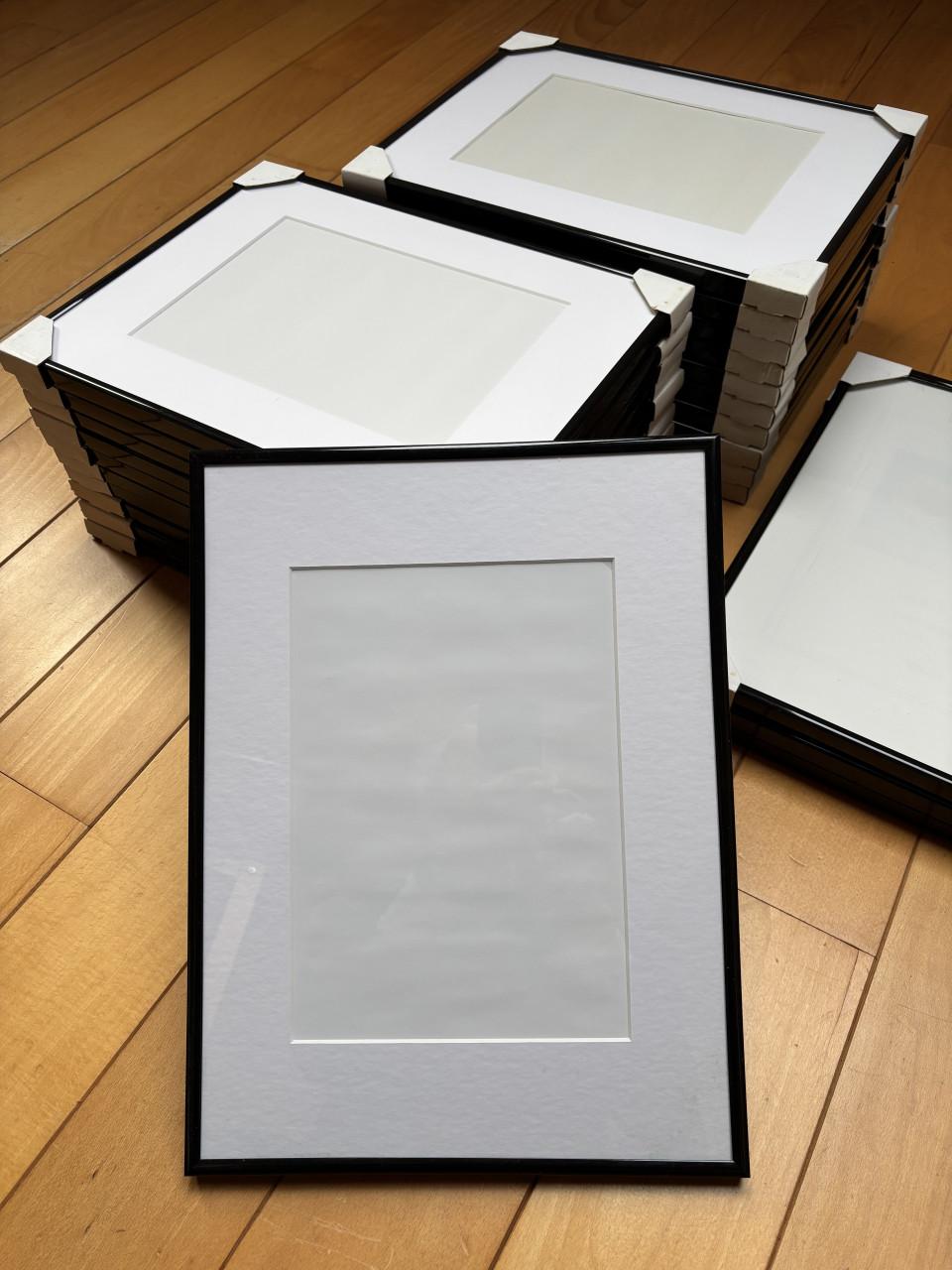 Fotolijsten ( zwart ) met passe-partout ( wit )