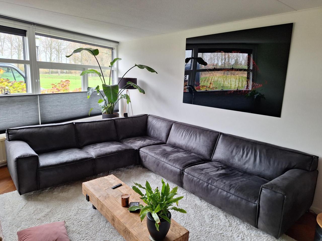 Grote antraciet lederen hoekbank in zeer goede staat