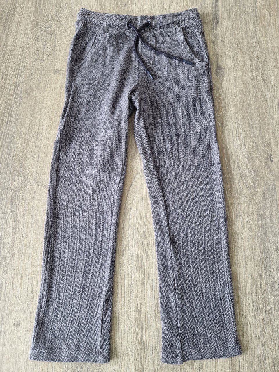 Grijze Hema lange broek maat 110/116