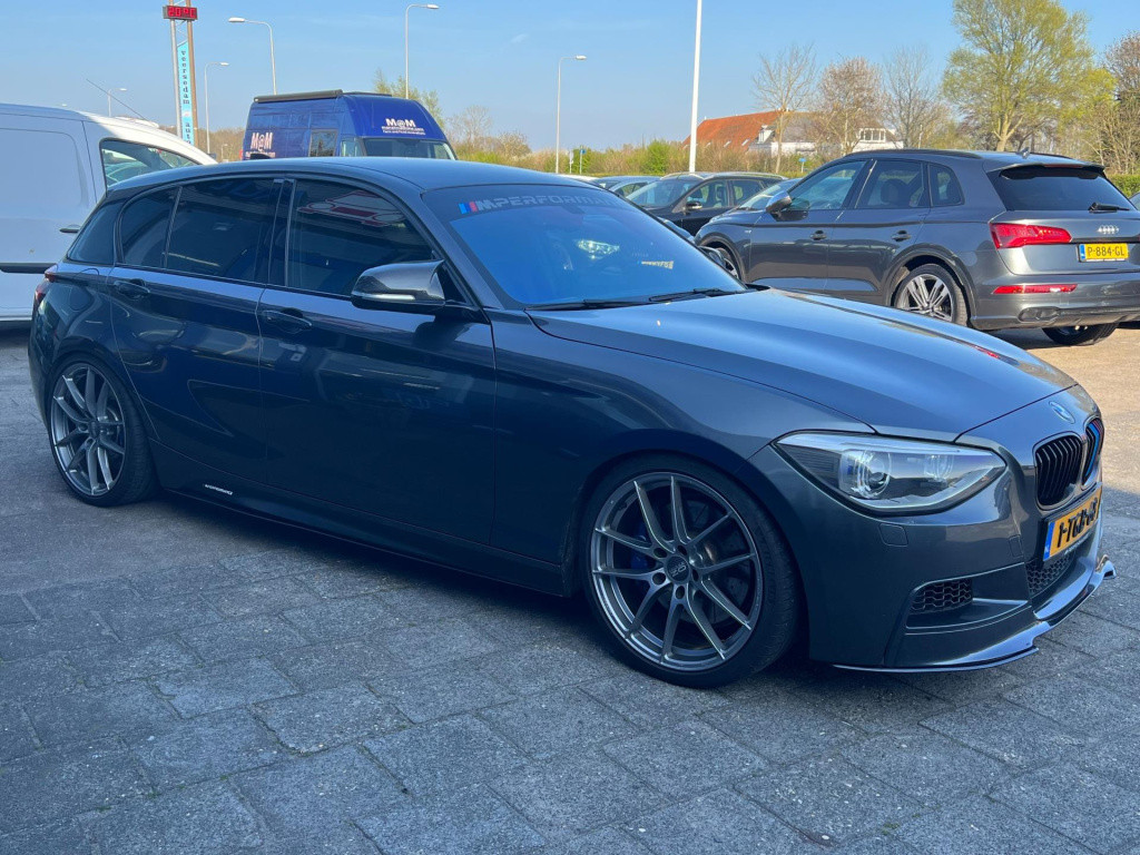 BMW 1 Serie m135i xdrive high executive, customized, stage 2 437 pk!