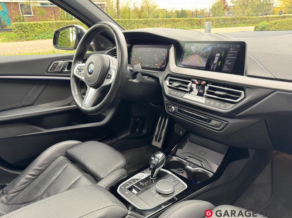 BMW 1 Serie m135i xdrive high executive edition pano orig.nl