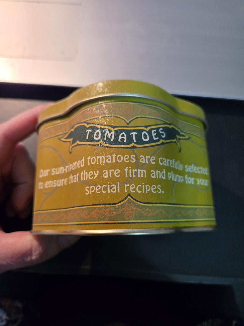 Vintage tinnen blikje met een 'Three Sisters Brand' tomatenlabel uit 1920