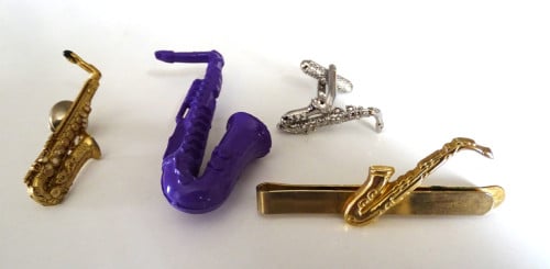 Saxofoon speldjes en manchetknoop