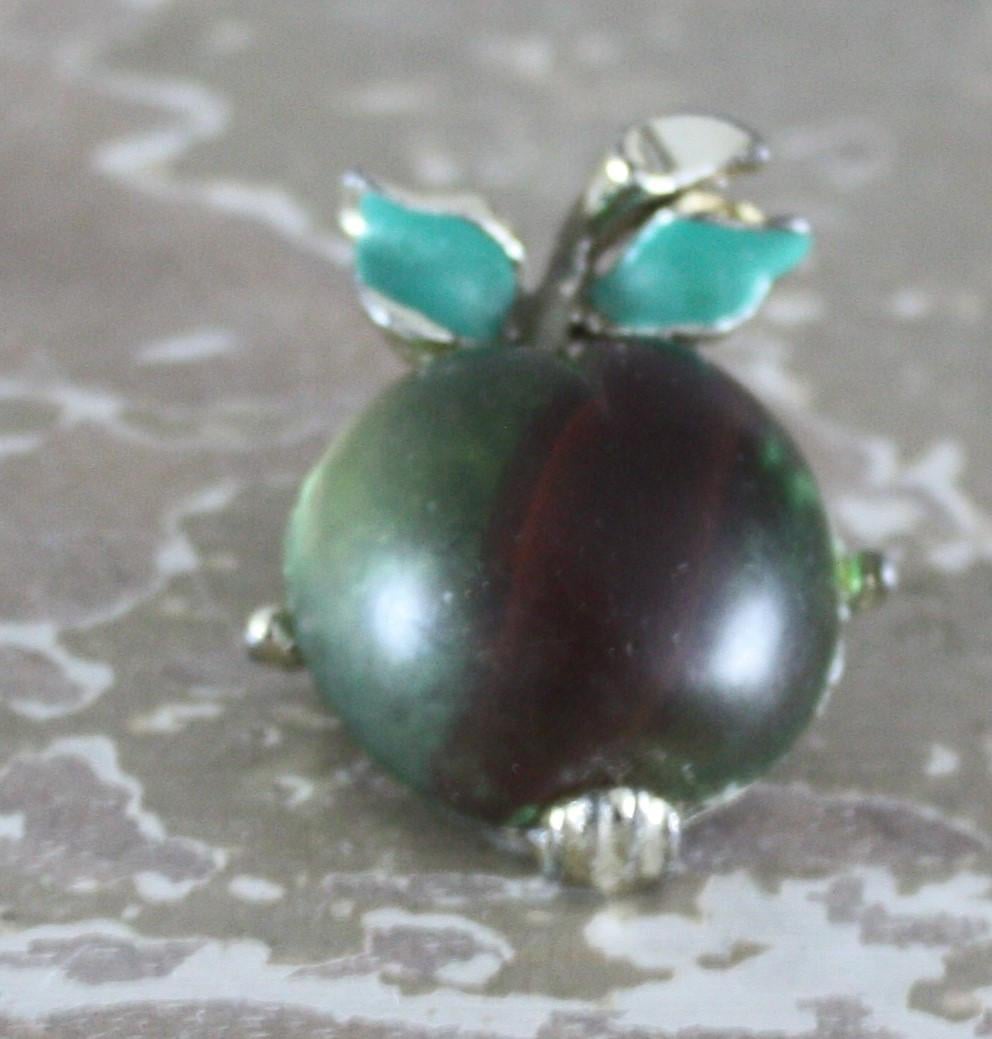 Broche metal en glas appel