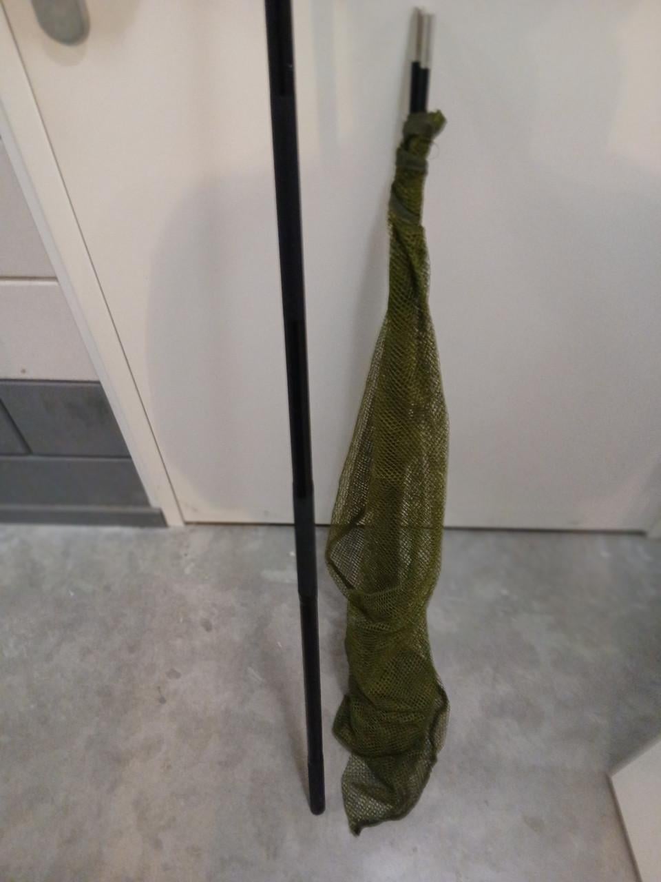 Zeebaarshengel met molen