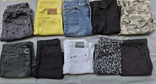 10 meisjes broeken 164/170 pakket