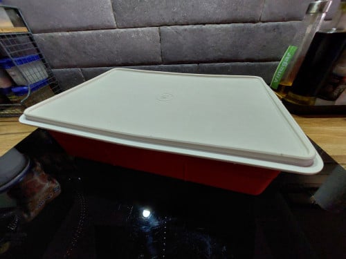 Tupperware vintage naaidoos oranje/crème