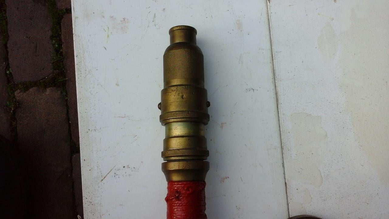 Koperen brandweerspuit