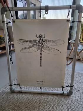 2 tuinposters en steigerbuisframe